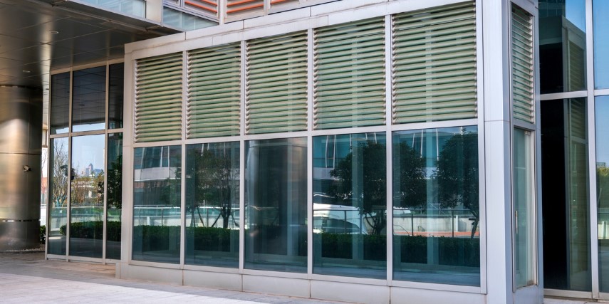 Exterior view of a row of windows on an office building.