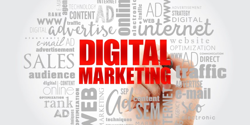 A white background shows a smattering of marketing-related words in light gray, while the words "Digital Marketing" are in red in the foreground.
