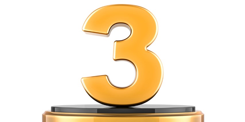 A gold numeral "3" sits on a trophy podium against a white background.